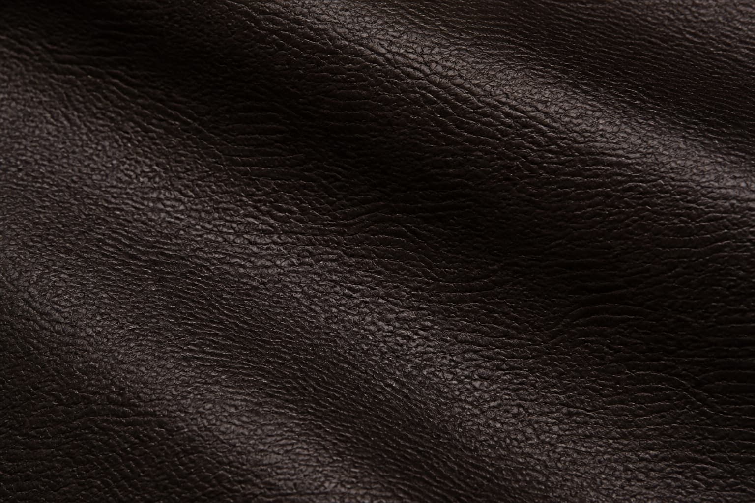 Fine-grain leatherette wrap for rigid packaging
