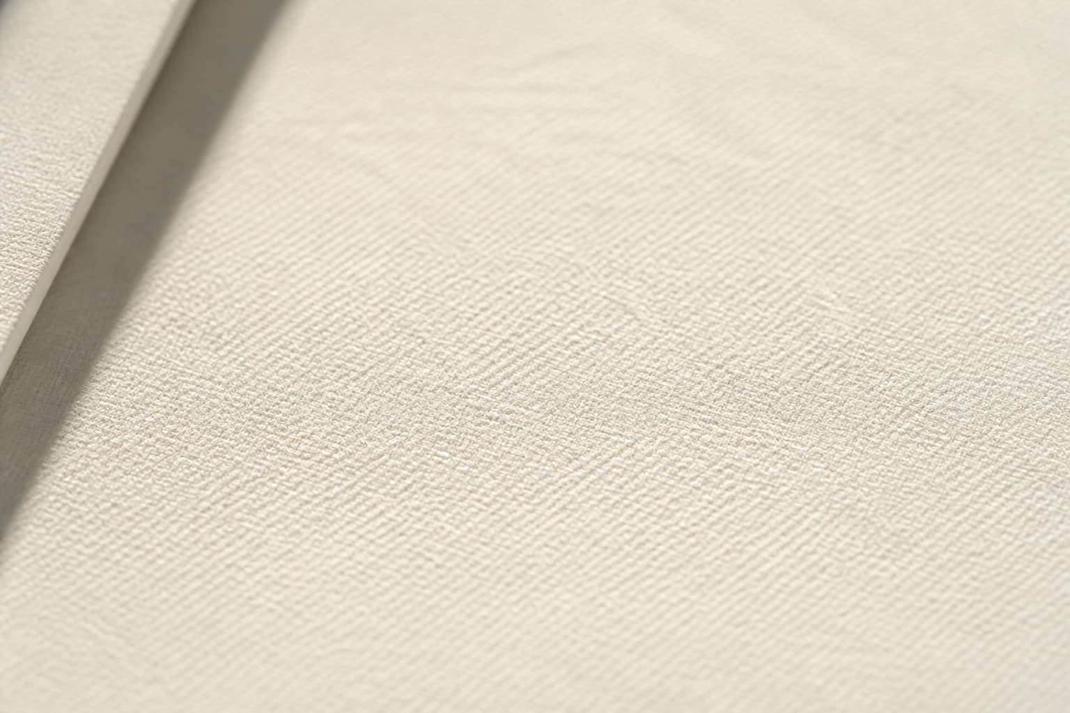 Textured cream paper used on rigid box exteriors